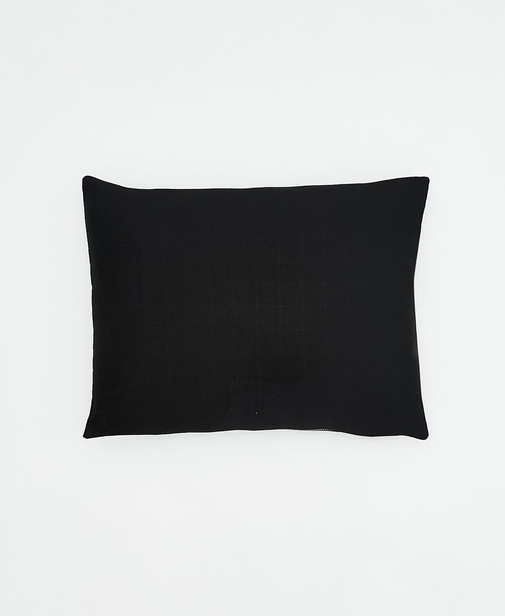 back of cross-stitch small pillow in charcoal black made of 100% organic cotton twill