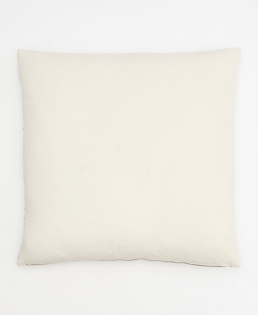 back of bone cross-stitch throw pillow made from 100% organic cotton in India