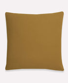 back of ochre yellow cross-stitch throw pillow