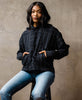 organic cotton quilted hoodie with hand-stitched geometric crosshatch embroidery