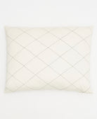 standard pillow sham in natural white with black embroidery forming a diamond stitch patten