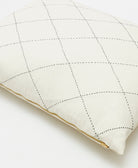 natural white pillow sham for a standard sized pillow with gold zipper closure & black embroidery details