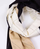 eclipse long scarf with detailed hand-stitching in tones of black, white and tan