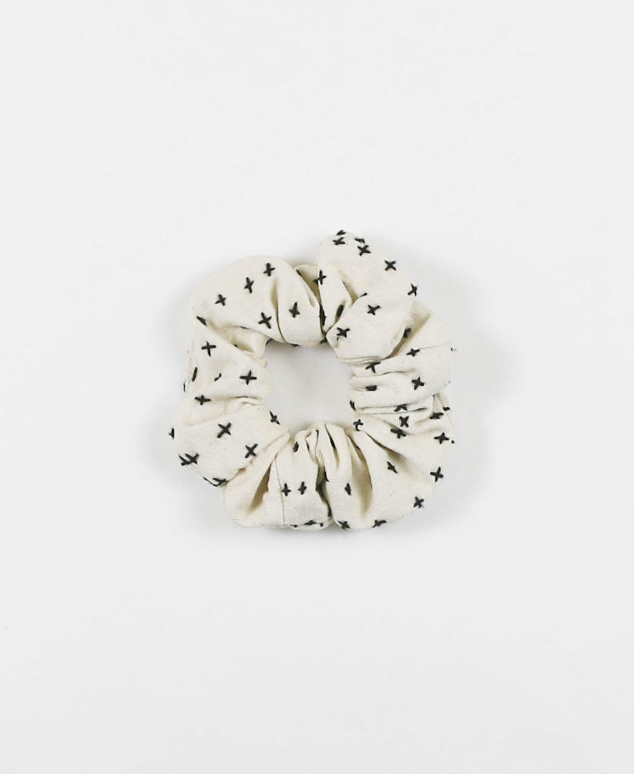 embroidered scrunchie in bone ivory with black embroidery made from 100% organic cotton