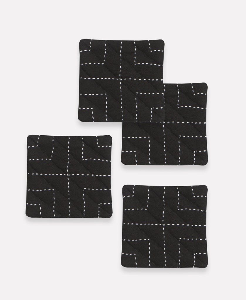 handmade fabric coasters with hand-stitched embroidery in a set of 4 in charcoal black