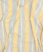 ethically made block print shower curtain handmade in India by women artisans with bold yellow and blue stripe design