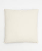 solid white back of sustainable throw pillow with ethical down feather pillow insert