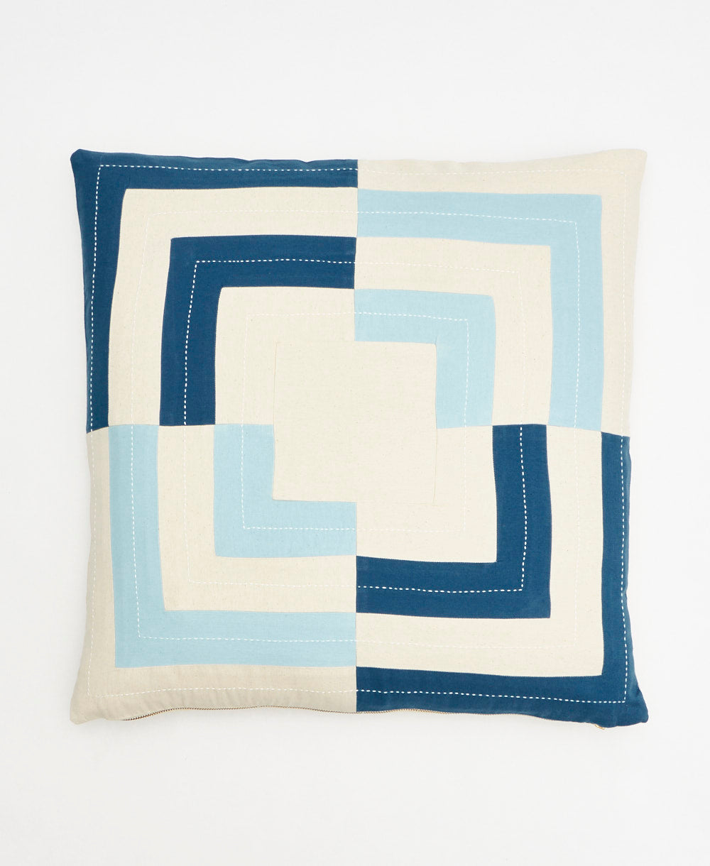 light blue and cobalt blue square throw pillow  with bold geometric design made from organic cotton