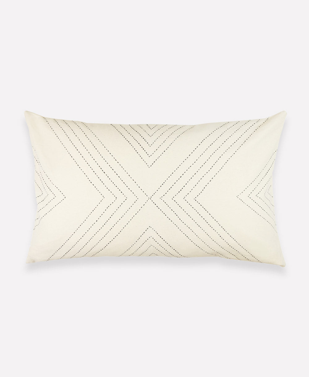 natural white lumbar pillow with geometric stitch embroidered pattern in black