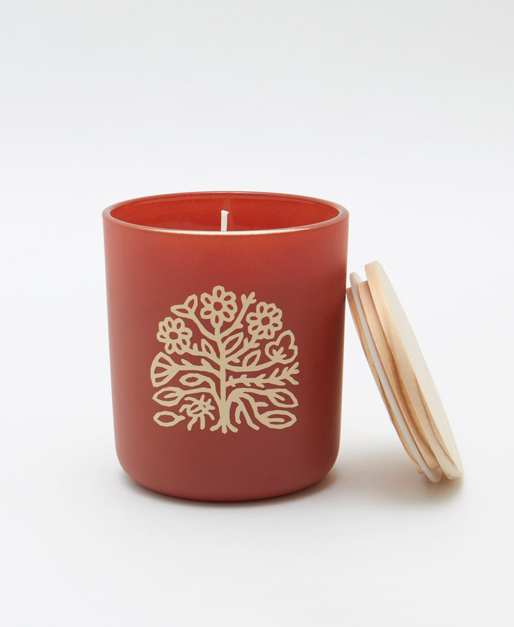 matte red glass jar candle with Anchal logo & removable raw wood lid