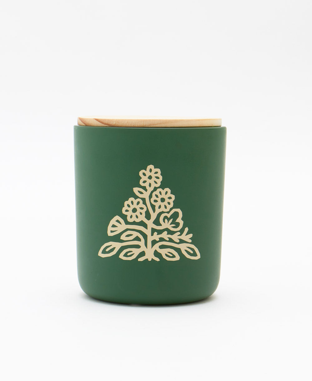 non-toxic candle hand-poured in the USA in green jar with light wood raw maple lid in sandalwood scent