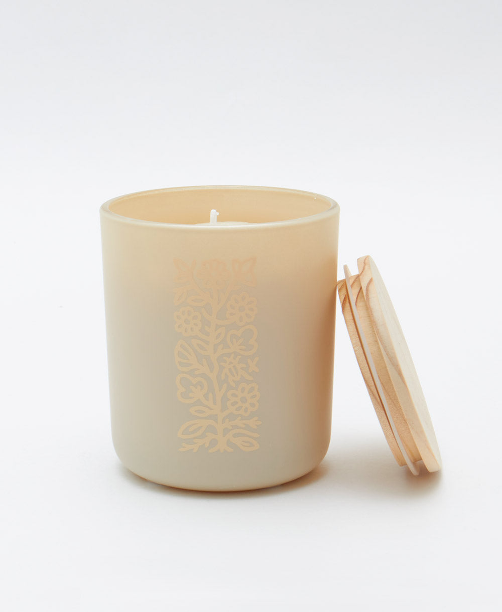 glass jar candle in matte cream with raw wooden maple lid with an eco-friendly cotton wick