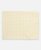 mustard yellow grid block print tablecloth in rectangular shape made from organic cotton