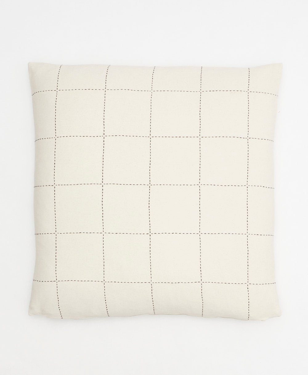 off-white grid pattern throw pillow made from organic cotton