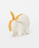 stuffed bunny in natural white with mustard yellow accents handmade in India from organic cotton