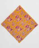 orange bandana with magenta elephant print with sky blue embroidery along edges