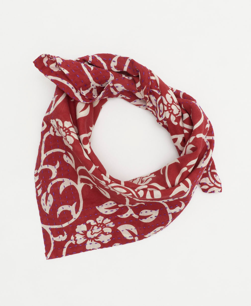 red cotton bandana with bold white floral design and hand-embroidered in India