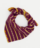 purple bandana scarf with tan stripes and hand-embroidered edges made by women artisans