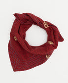 hand-stitched crimson red bandana scarf with a subtle diamond print and graphic tan flower pattern