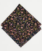 eco-friendly black bandana with pink and green floral print and hand-embroidered edges