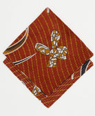 eco-friendly bandana in rust brown, mustard yellow and black abstract print