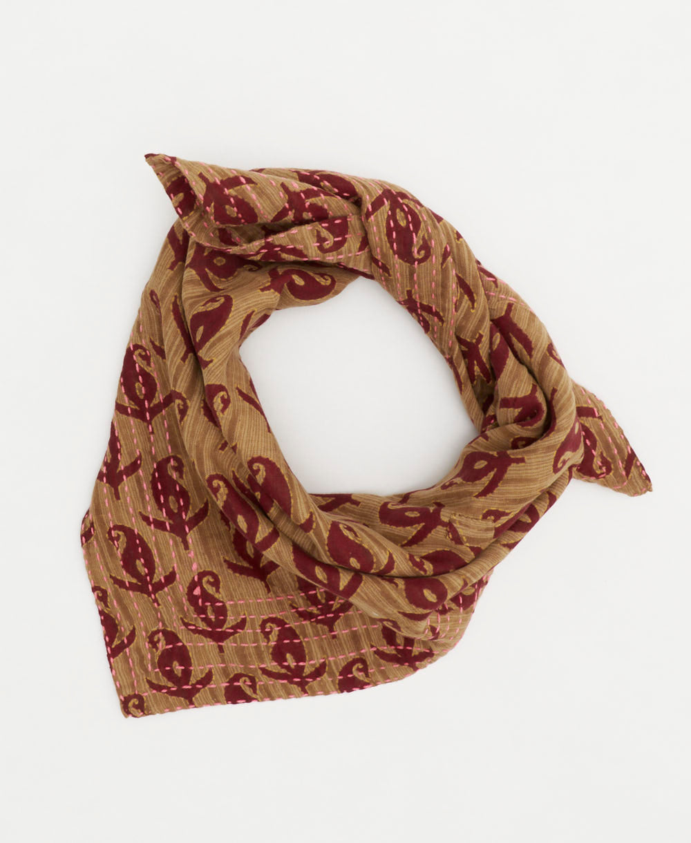 light brown bandana scarf with red abstract flowers