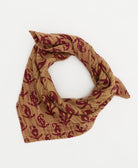 light brown bandana scarf with red abstract flowers