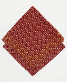 unique red bandana scarf with tan geometric pattern and hand-embroidered edges