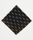 black cotton bandana with white diamond print and yellow hand-embroidered stitching around edges