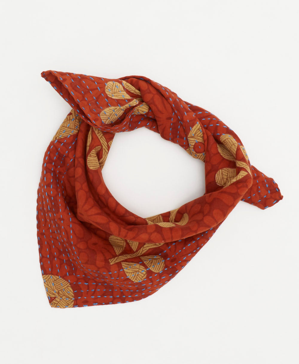 rust vintage bandana with tan leaf pattern accents