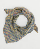 sustainable cotton bandana with hand-stitched embroidery around the edges