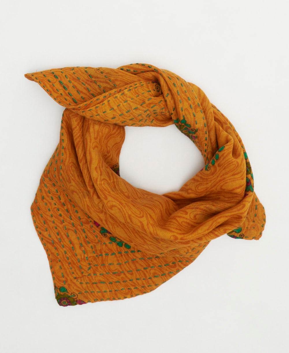 sustainable cotton bandana with hand-stitched embroidery around the edges