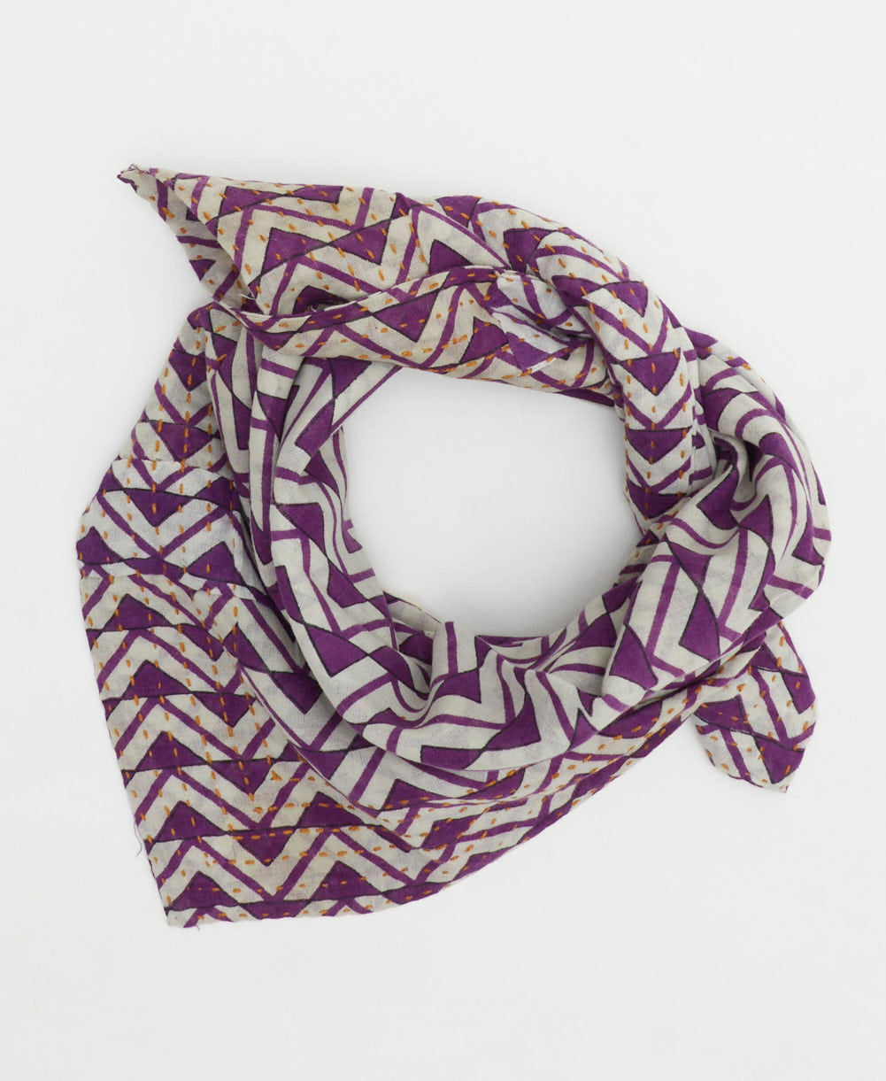sustainable cotton bandana with hand-stitched embroidery around the edges