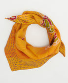 sustainable cotton bandana with hand-stitched embroidery around the edges