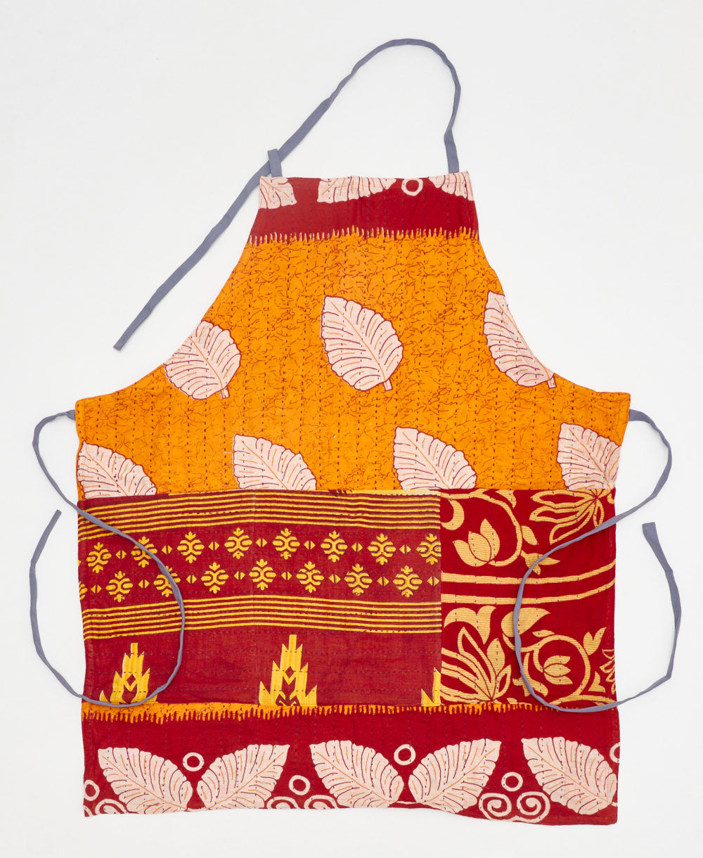 Handmade red and yellow leaf print adjustable bib apron featuring kantha stitching