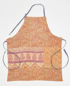 Handmade orange paisley adjustable bib apron featuring kantha stitching