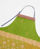 sustainable adjustable apron in lime green & tan floral print made from one-of-a-kind saris with black embroidery