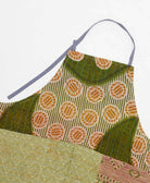 sustainable adjustable apron in orange & olive circle print made from one-of-a-kind saris with blue embroidery