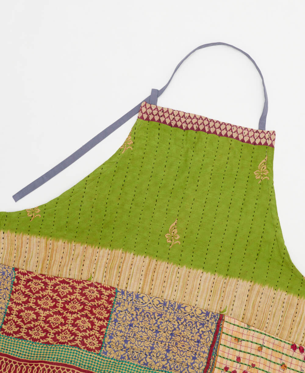 sustainable adjustable apron in lime & red medallion print made from one-of-a-kind saris with blue embroidery