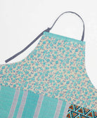 sustainable adjustable apron in sky blue floral print made from one-of-a-kind saris with hot pink embroidery