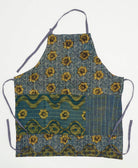 one-of-a-kind navy blue kitchen apron made from vintage fabrics with a golden floral print with hand-embroidered stitching