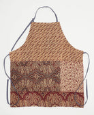 cotton apron for gardening or cooking in a beige and maroon paisley print with delicate floral print