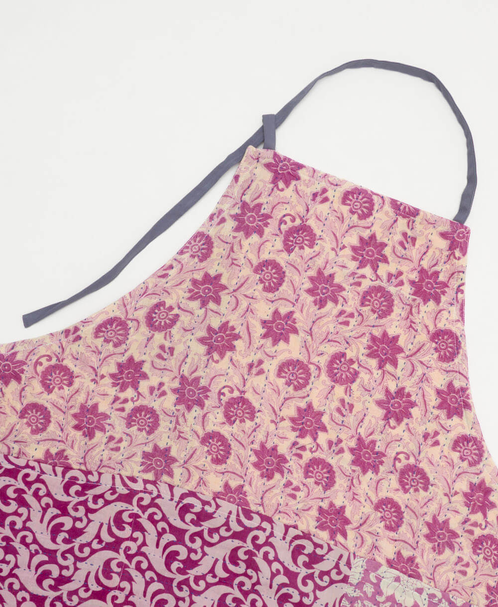 ethically made cotton apron in a orchid pink floral print handmade from upcycled fabric