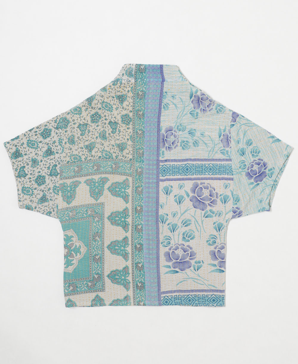 ethically made quilted jacket in a sky blue & lavender rose print handmade by artisans in India