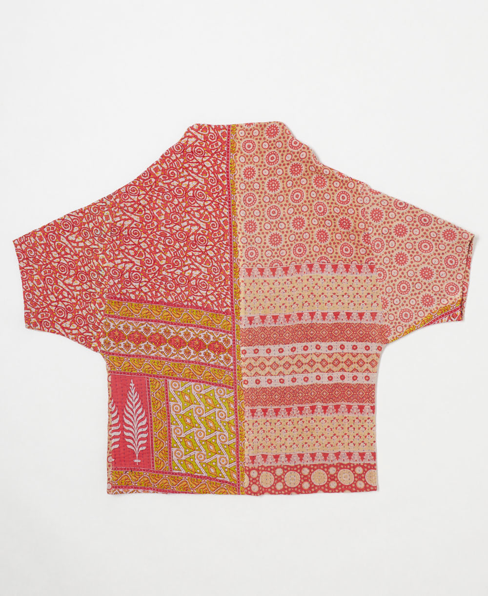 ethically made quilted jacket in a bubblegum pink circle print handmade by artisans in India