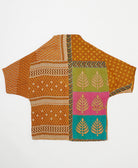 ethically made quilted jacket in a burnt orange tiny floral print handmade by artisans in India