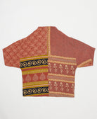 ethically made quilted jacket in a brick red medallion print handmade by artisans in India