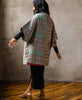 kantha long quilted jacket in one-of-a-kind mint green and pink pattern with oversized sleeves and cocoon silhouette