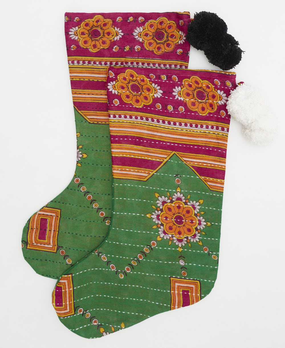 green holiday stocking with hot pink & orange geometric floral with either black or white pom pom accents