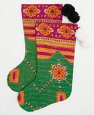 green holiday stocking with hot pink & orange geometric floral with either black or white pom pom accents